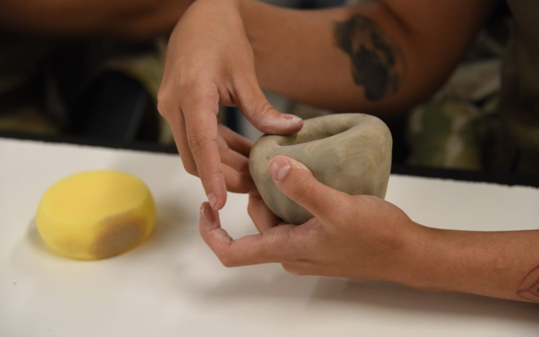 Learning language by doing with pottery