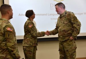 CSM JoAnn Naumann shakes hands with DLIFLC Commandant Col. James Kievit after her keynote address.